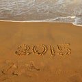 Year 2015 number on sandy beach Royalty Free Stock Photo