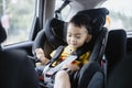 1 Year Old Adorable Asian Boy Alone Looking Around From Car Seat in the Car Royalty Free Stock Photo