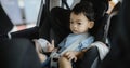 1 Year Old Adorable Asian Boy Alone Looking Around From Car Seat in the Car Royalty Free Stock Photo