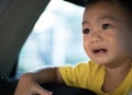 1 Year Old Adorable Asian Boy Shouting Crying Alone Around in the Car Royalty Free Stock Photo
