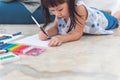 A 3 year old Asian baby girl Lying on the floor Royalty Free Stock Photo