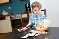4 year old boy and smashed his piggybank Royalty Free Stock Photo