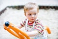 Year old boy swinging on a swing Royalty Free Stock Photo