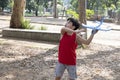 10 year old Brazilian child playing with his Styrofoam plane on a sunny afternoon_4