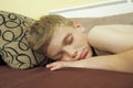 10 year old Caucasian boy fell asleep on the couch. Children& x27;s dream. Sleep problems, falling asleep, insomnia