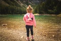 2-3 year old child with diper standing at Gruner see, Green lake rocky shore Royalty Free Stock Photo