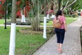 40-year-old Latina woman walks colonial streets of a Latin American town happy and relaxed enjoys the sunny day in tranquility