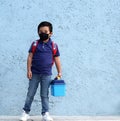 6-year-old Latino boy with covid-19 protective mouthguards, back to school with new normality Royalty Free Stock Photo