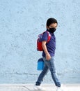 6-year-old Latino boy with covid-19 protective mouthguards, back to school with new normality Royalty Free Stock Photo