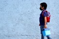 6-year-old Latino boy with covid-19 protective mouthguards, back to school with new normality Royalty Free Stock Photo