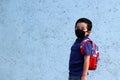 6-year-old Latino boy with covid-19 protective mouthguards, back to school with new normality Royalty Free Stock Photo