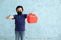 6-year-old Latino boy with covid-19 protective mouthguards, back to school with new normality Royalty Free Stock Photo