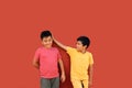 9-year-old Latino children get upset and bully each other as a form of physical, psychological, verbal abuse among students