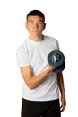 Nineteen year old teen boy exercising biceps Royalty Free Stock Photo