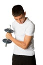 Nineteen year old teen boy exercising biceps Royalty Free Stock Photo