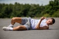 A 19 Year Old Teenage Boy Doing Situps In A Public Park Royalty Free Stock Photo