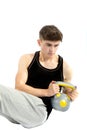 18 year old teenage boy exercising with weights