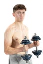 18 Year old teenage boy lifting weights Royalty Free Stock Photo