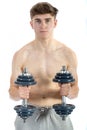18 Year old teenage boy lifting weights Royalty Free Stock Photo