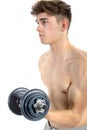 18 Year old teenage boy lifting weights Royalty Free Stock Photo