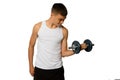 Nineteen year old teen boy exercising with a dumbbell Royalty Free Stock Photo