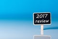 2017 year review on blue background. Results of the year Royalty Free Stock Photo