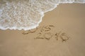 2015 and 2016 year on the sand beach Royalty Free Stock Photo