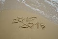 2015 and 2016 year on the sand beach Royalty Free Stock Photo