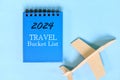Year 2024 travel goals. Beautiful creative flat lay composition. Royalty Free Stock Photo