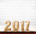 2017 Year wood texture on marble table with white ceramic tile w Royalty Free Stock Photo