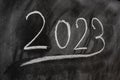 Year 2023 written on a blackboard with chalk Royalty Free Stock Photo