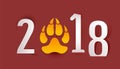 2018 year of yellow dog in Chinese calendar. Dog footprint with claws Royalty Free Stock Photo