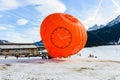 Yearly International Hot Air Balloon Festival in Chateau d`Oex, Switzerland. Preparation of the balloons