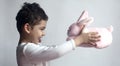 5 years adorable little kid boy playing with plush bunny toy