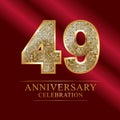 49 years anniversary celebration logotype.49th years anniversary red ribbon and gold balloon on gray background. Royalty Free Stock Photo