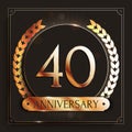 40 years anniversary gold banner on dark background.