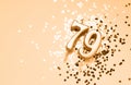 79 years celebration festive background made with golden candles in the form of number Seventy-nine