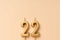 22 years celebration festive background made with golden candles in the form of number twenty-two