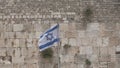 75 years since the founding of the State of Israel. Flag of Israel.. Flag of Israel on the background of the Wailing Wall.