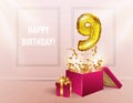 9 years with a Golden balloon. The celebration of the anniversary. Balloons with sparkling confetti fly out of the box, number 9 Royalty Free Stock Photo