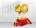 40 years of Golden balloons. The celebration of the anniversary. Balloons with sparkling confetti fly out of the box, number 40. Royalty Free Stock Photo