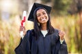 Years of hard work paid off. Cropped portrait of an attractive young female student celebrating on graduation day. Royalty Free Stock Photo