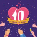 10 years of love celebrating 10th anniversary with clapping people and confetti.