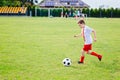 8 years old boy child playing football Royalty Free Stock Photo