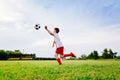 8 years old boy child playing football Royalty Free Stock Photo