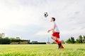 8 years old boy child playing football Royalty Free Stock Photo