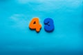 Number on a bright blue background.