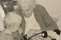 90 years old great-grandmother is spending time with her two years old great-grandson