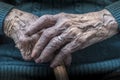 Elderly female hands manicure and cane Royalty Free Stock Photo