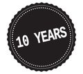 10-YEARS text, on black sticker stamp.